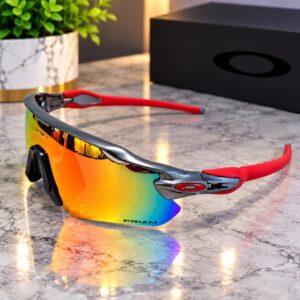 Gafas deportivas Oakley lente naranja detalle rojo